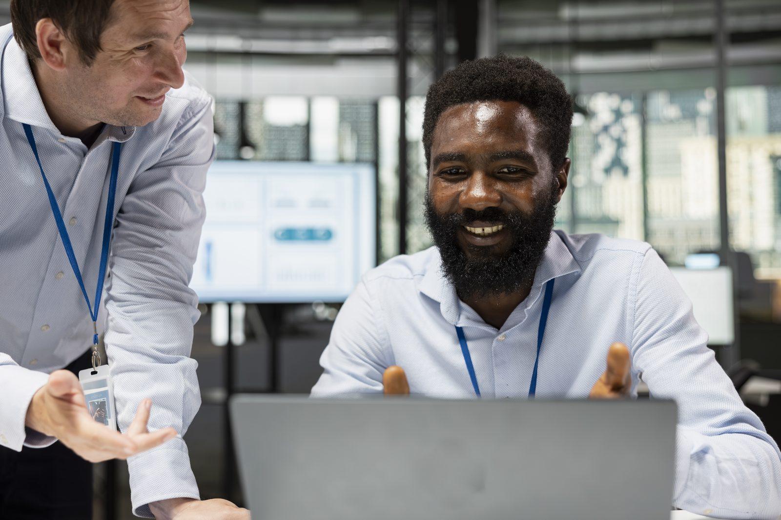 Quantumedge engineers reviewing a client system together
